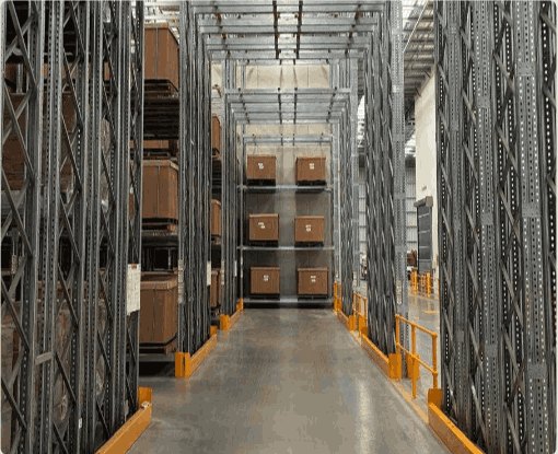 Aisle between tall pallet racks with cartons on the shelves.